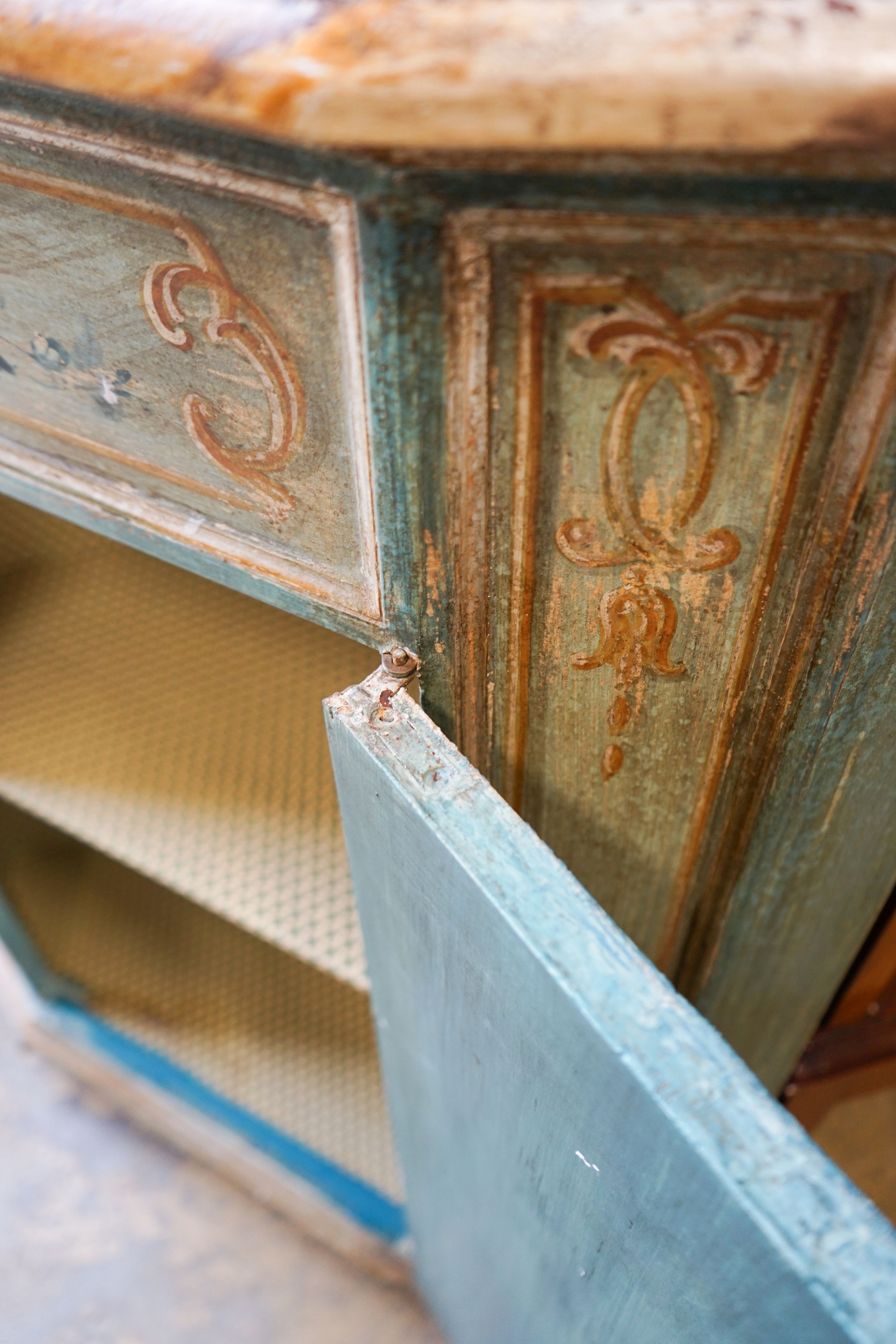 A mid 20th century Italian painted faux marble top corner cabinet, width 78cm, depth 49cm, height 99cm